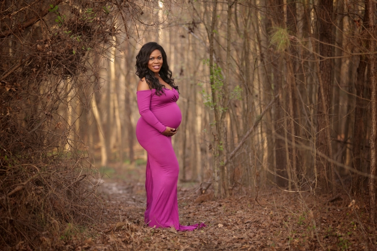 Raleigh maternity photographer - image of pregnant lady in pink dress