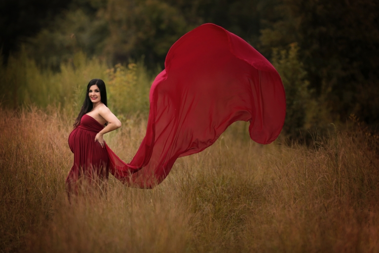 Raleigh maternity photography - picture of pregnant lady in flowing red gown