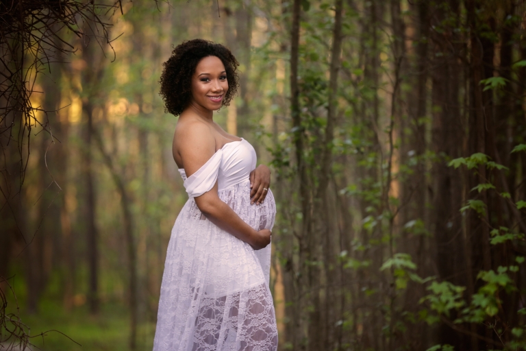 Raleigh Maternity photographer - pregnancy photo of lady holding her tummy