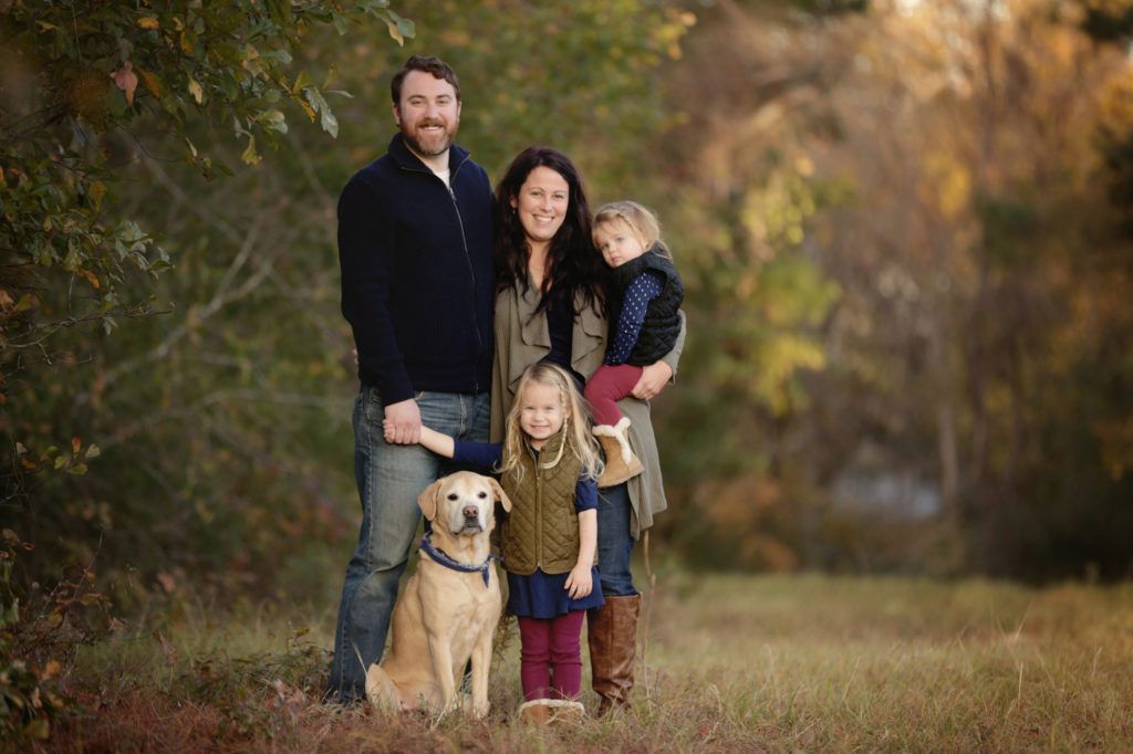 Raleigh family photography session outdoors with parents, children and dog