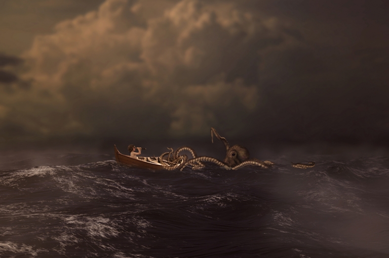 Making magical images come true! A little boy battles off a large octopus in a stormy ocean.