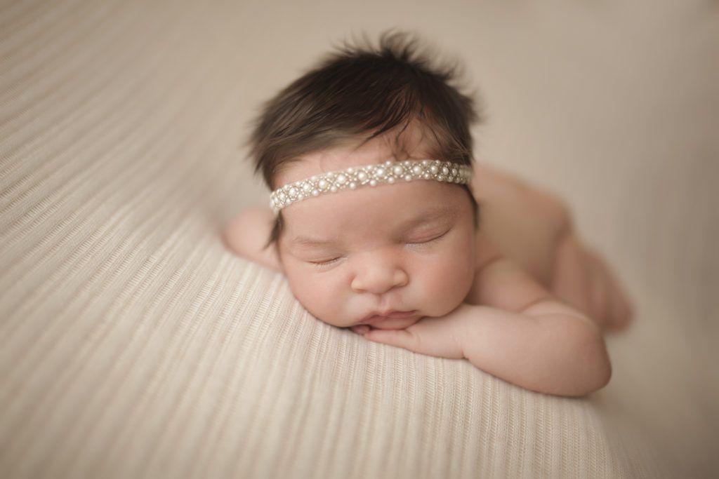 sleeping newborn baby photographed in Holly Springs, NC studio