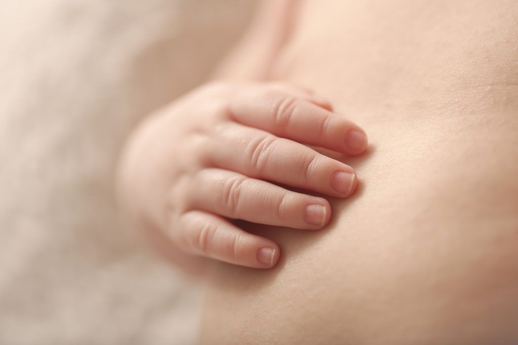 close up of newobrn baby hand photographed by Raleigh newborn photographer Nicola Lane